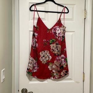 Red and floral slip dress. Super cute with thigh high boots. Only worn 1 time.